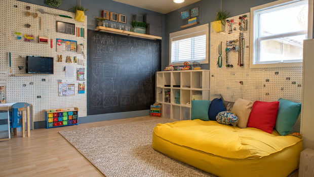 16 Whimsical Kids Room Ideas to Brighten Your Home Decor 15 Kids room with chalkboard wall and magnetic activity area.