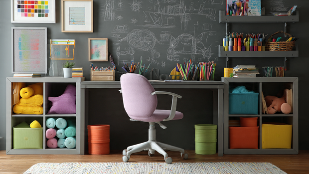 16 Whimsical Kids Room Ideas to Brighten Your Home Decor 13 Kids study area with chalkboard wall, mini desk, and colorful storage.