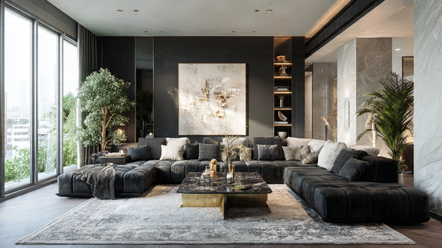 Modern living room with black couch, marble coffee table, gold accents, and cozy neutral decor.